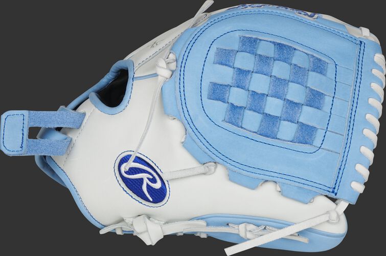 Thumb of a white RLA120-3CB Liberty Advanced Color Series 12-Inch infield/pitcher's glove with a columbia blue Basket web