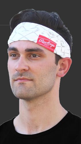 A guy wearing a white Rawlings multi-purpose neck gaiter as a head band - SKU: RC40005-100