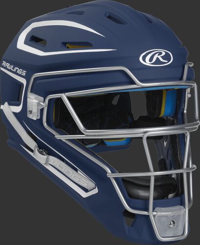 Front right of a navy CHMCHJ Rawlings Mach junior catcher's helmet