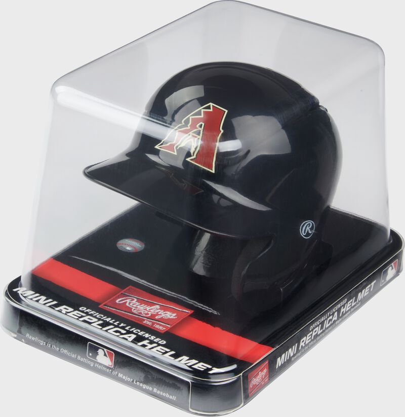 A black Arizona Diamondbacks mini helmet in a clear packaging case loading=
