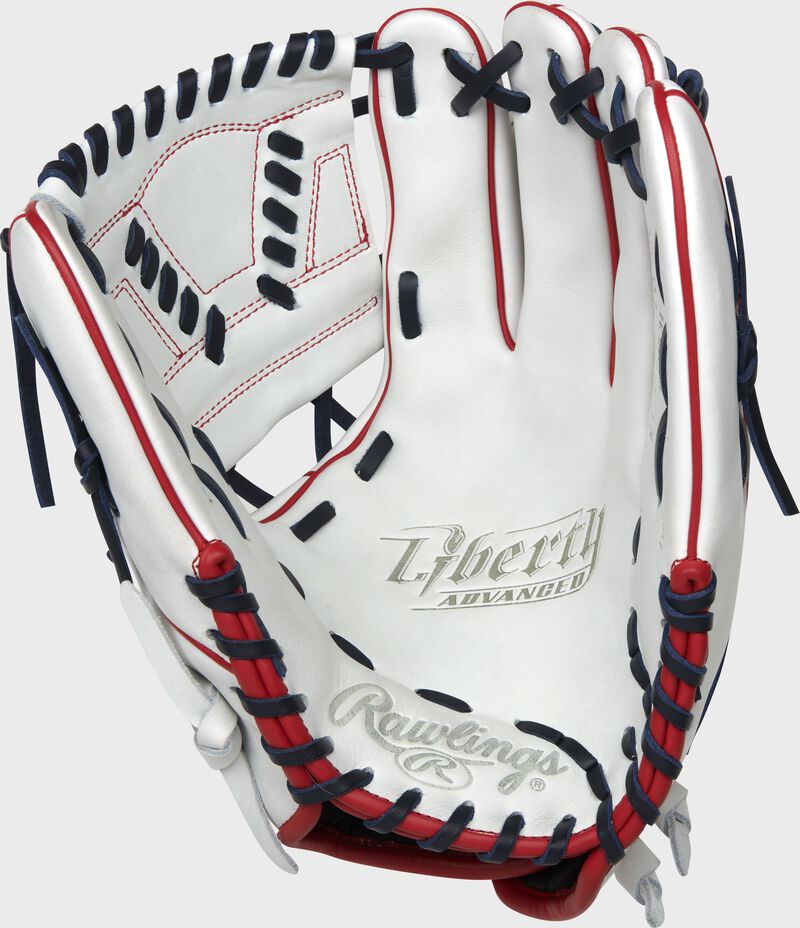 White palm of a Rawlings Liberty Advanced softball glove with navy laces - SKU: RLA120-31WNS