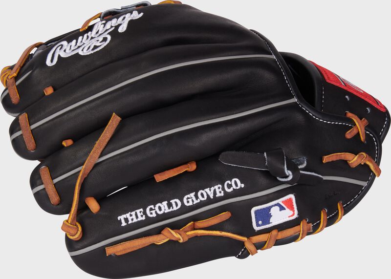 Black back of a Heart of the Hide 11.5" infield glove with the MLB logo on the pinky