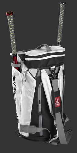 Right angle of a white R601 Hybrid players duffel bag standing up with two bats