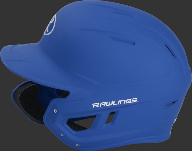 Left side of a MACHEXTL junior Rawlings batting helmet with a one-tone matte royal shell
