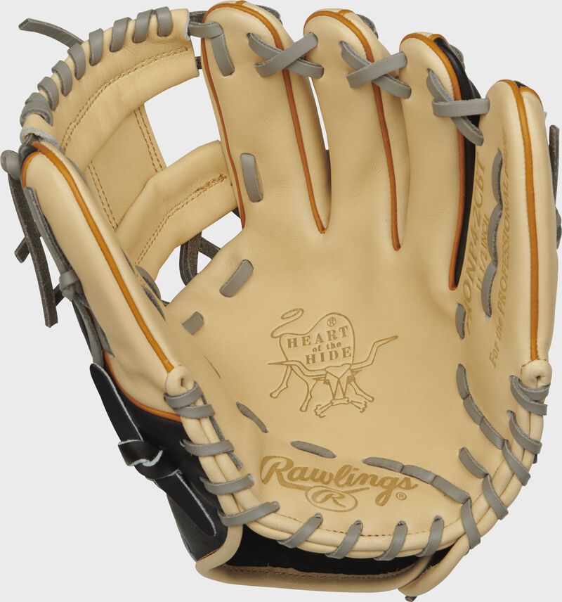 Shell palm view of black, camel, and gray Rawlings Heart of the Hide 11.5-inch infield glove loading=