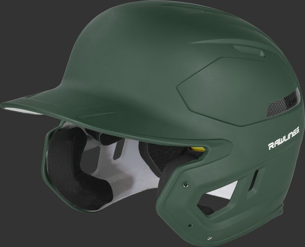 Left angle view of a CAR07A MACH Carbon high school college batting helmet with a dark green shell