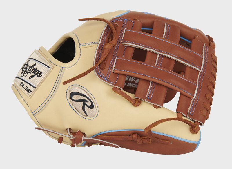 Camel thumb of an exclusive Pro Preferred Wing Tip infield glove with a bruciato H-web - SKU: PROS205W-6BRC