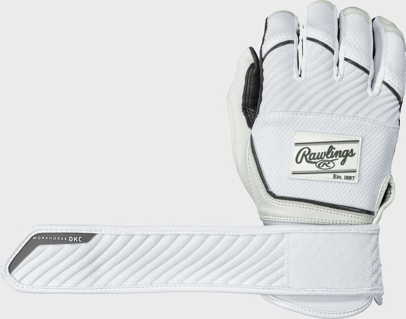 Back of a white Women's Workhorse OKC compression strap fastpitch batting glove with the wrist strap extended out