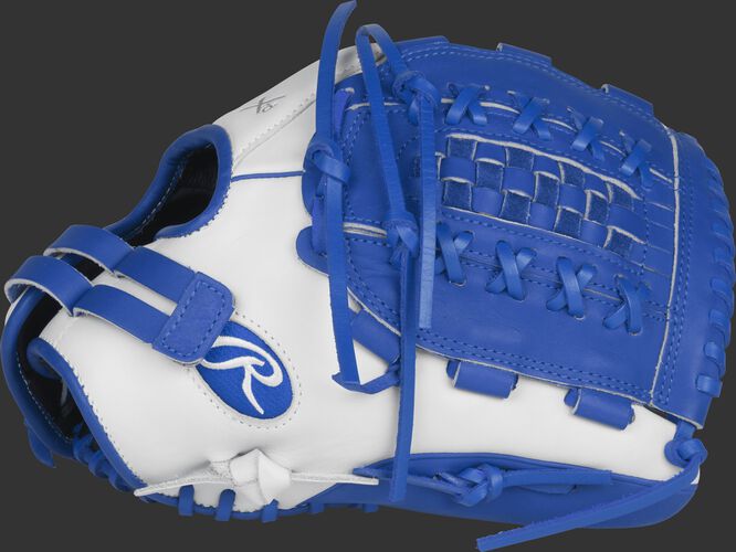 Thumb view of a white RLA125-18WR Liberty Advanced Color Series glove with royal trim and a royal Double-Laced Basket web