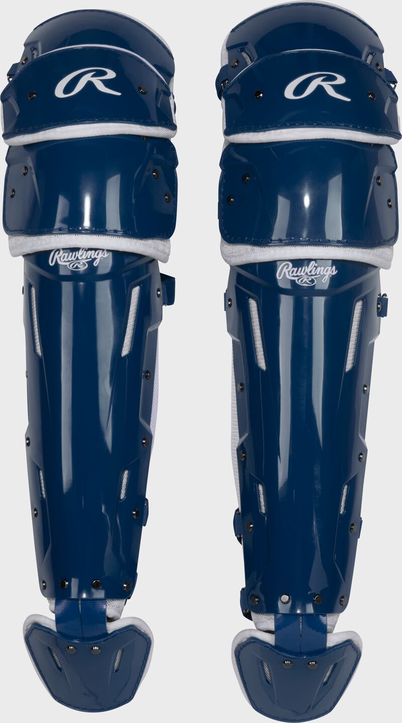 A set of navy Mach Pro Series leg guards loading=