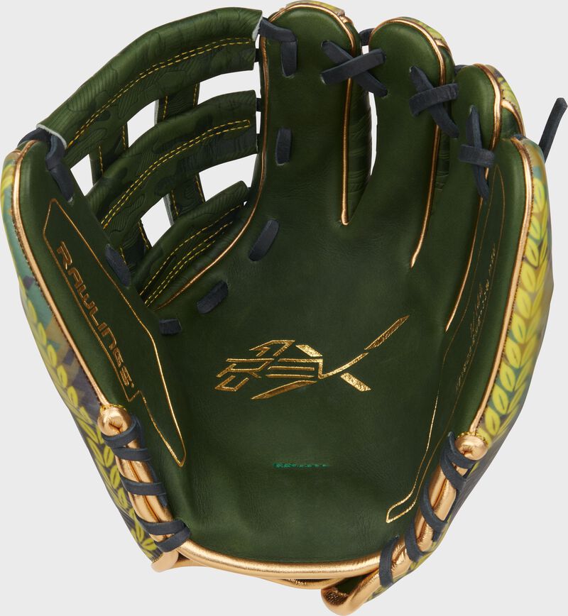 Military Green leather palm of a Rawlings REV1X 11.75" Veteran's Day infield glove loading=