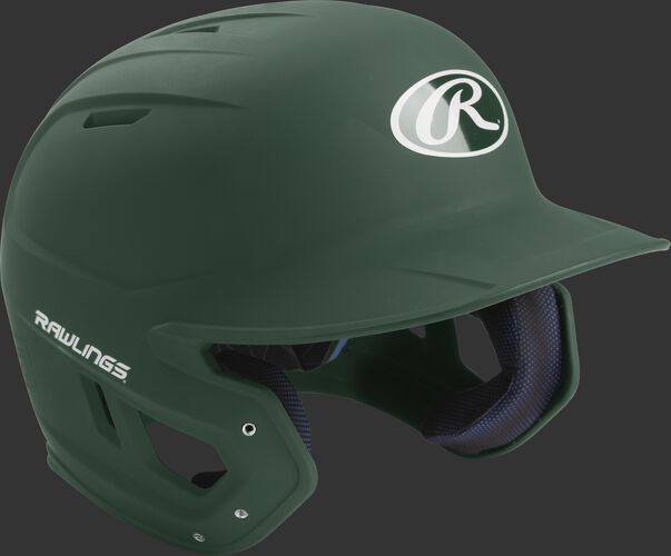 Right angle view of a matte MACH Senior batting helmet with a dark green shell
