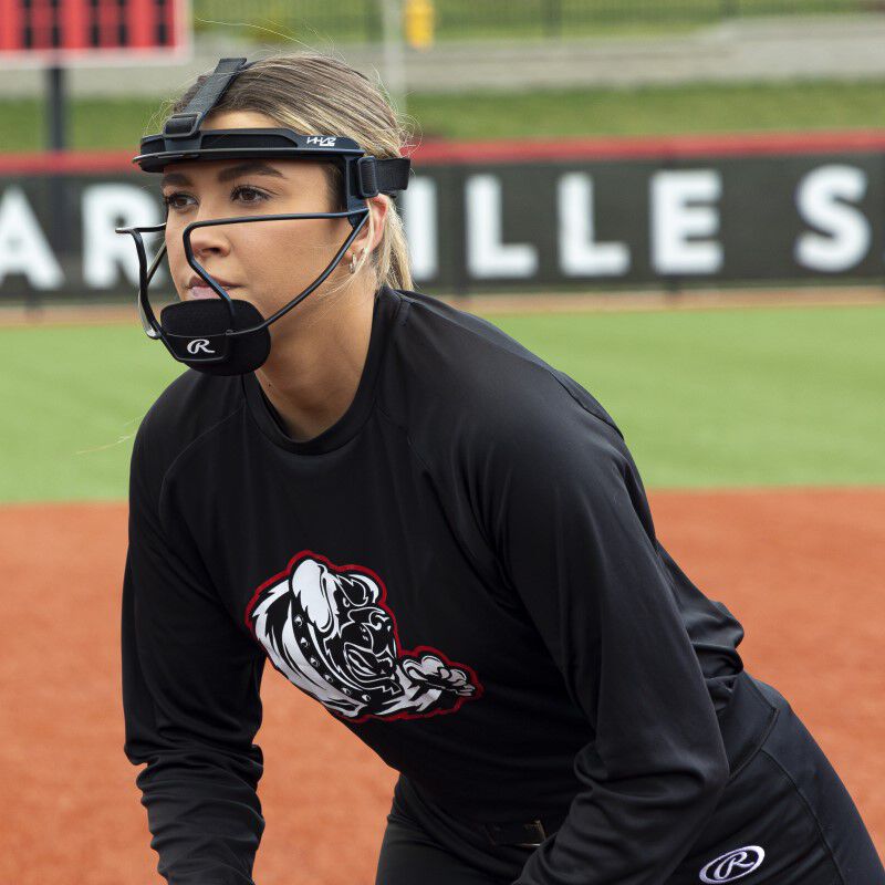 A pitcher on the mound wearing a black Hi-Viz softball fielder's mask - SKU: RSBFMV