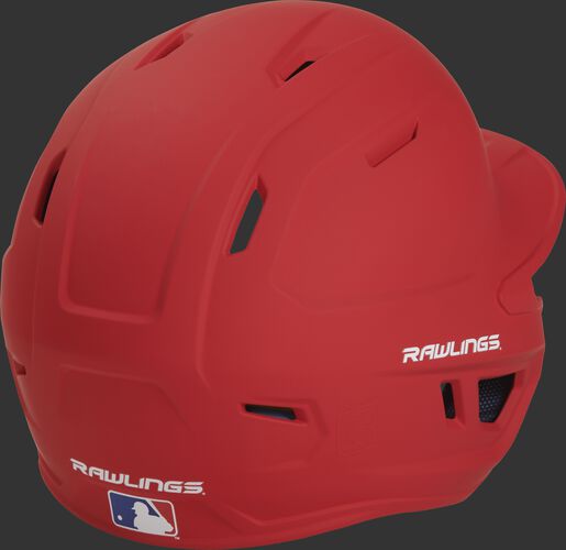 Back right of a matte scarlet MACHEXTR Rawlings high school/college batting helmet