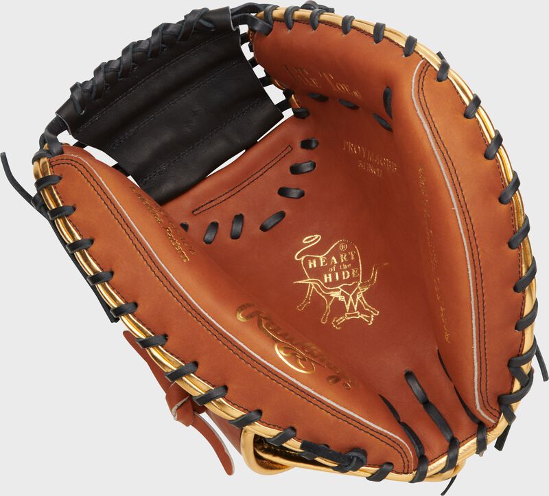 Golden brown palm of a Heart of the Hide ColorSync 8.0 catcher's mitt with gold stamping and black laces - SKU: PROYM4GBB