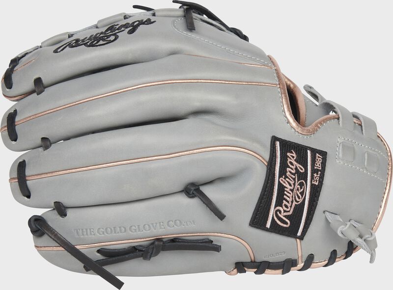 Back of a gray Liberty Advanced Color Series 12.5-Inch fastpitch glove with a black Rawlings patch - SKU: RLA125-18GRG loading=