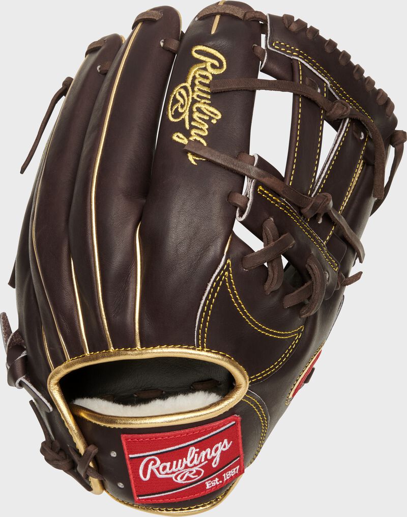 Back of a mocha Manny Machado Pro Preferred infield glove with a red Rawlings patch - SKU: PROSNP7-MM13