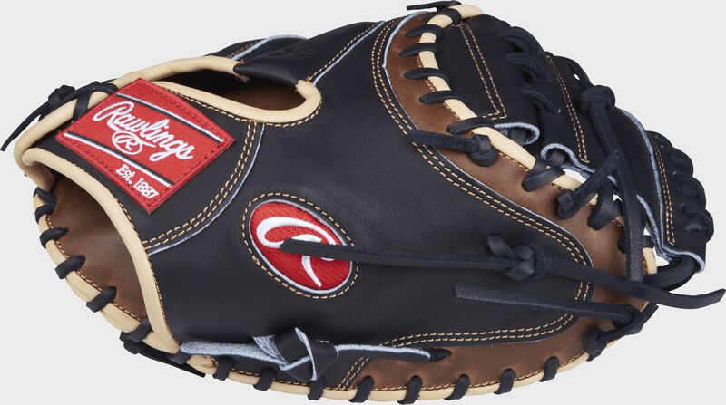 Thumb view of a PROCM33BSL Heart of the Hide 33-inch catcher's mitt with a black one-piece solid web loading=