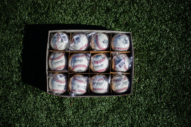 On open box of a dozen Rawlings Cal Ripken league baseballs - SKU: RCAL1