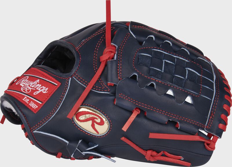 Thumb of a navy Gameday 57 Series Griffin Canning Pro Preferred glove with a gold Oval-R and navy Basket web - SKU: RSGRPROS19-11GC