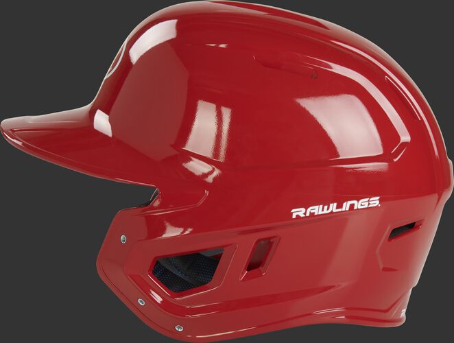 Left side of a scarlet MCH01A Mach baseball helmet compatible with MEXT face guard extension