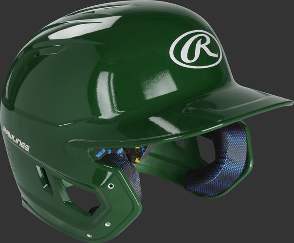 Right angle view of a MCC01 Rawlings Mach helmet with a gloss dark green shell