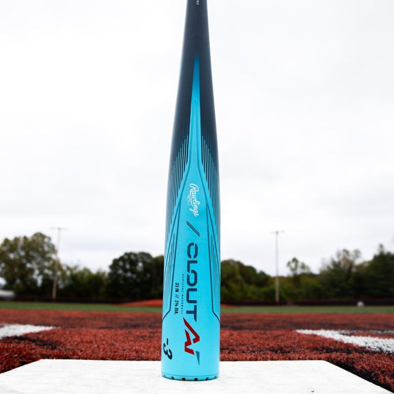 A blue Clout AI BBCOR bat standing on its end on top of home plate