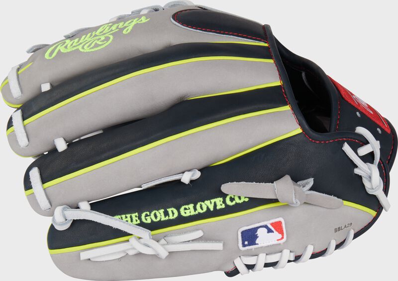 Gray/navy back of a Xander Bogaerts Heart of the Hide infield glove with the MLB logo on the pinky 