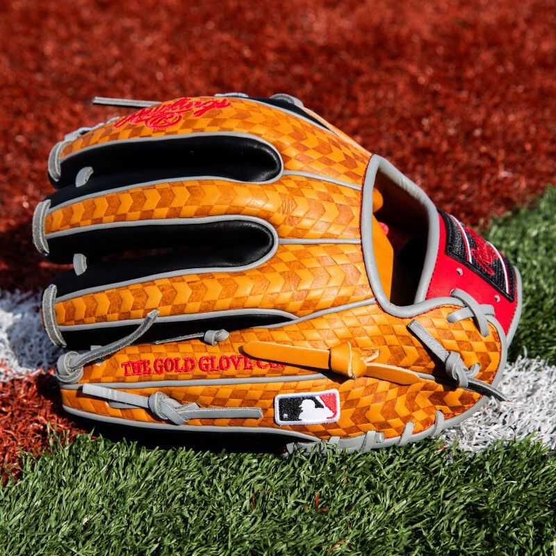 Tan printed leather back on a Heart of the Hide ColorSync 8.0 infield glove on a field