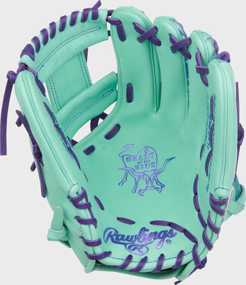 Palm of a Heart of the Hide 11.5-Inch Mint Infield Glove with purple stamping and laces