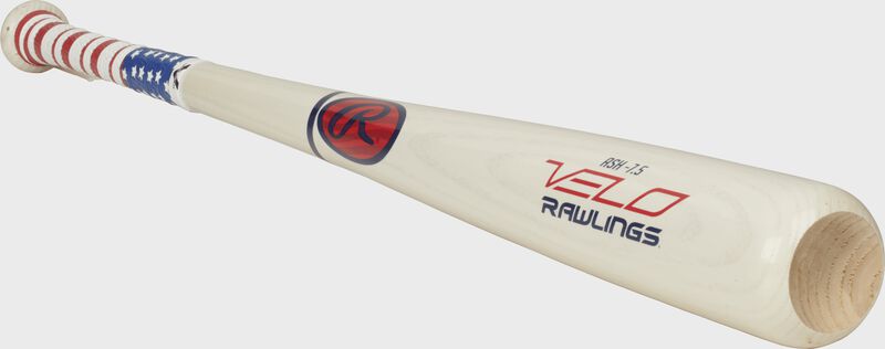 3/4 view of a white Y62AV Rawlings Velo youth ash bat