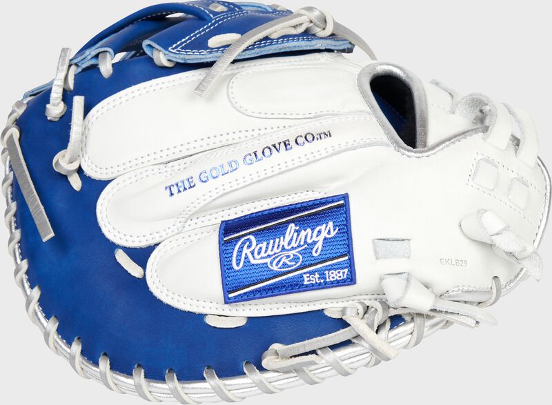 Back of a white/royal 34-Inch Liberty Advanced Color Series catcher's mitt with a royal Rawlings patch - SKU: RLACM34FPWRP