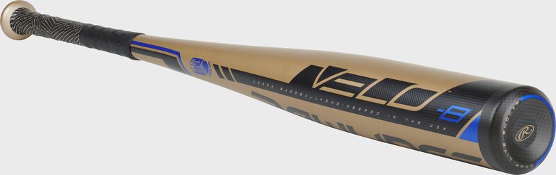 3/4 angle view of a UT9V8 -8 Rawlings Velo bat with black accents on a gold barrel
