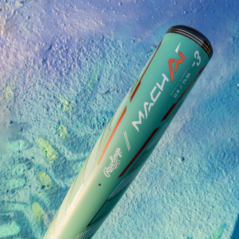 A Mach AI -3 BBCOR bat in front of a green/blue painted wall - SKU: RBB4MC3