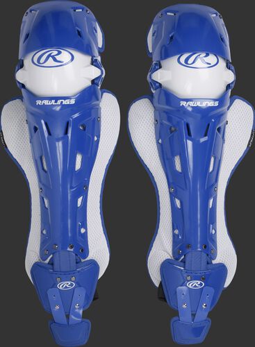 A pair of adult royal Rawlings Mach catcher's leg guards with white accents - SKU: MCHLGA-R