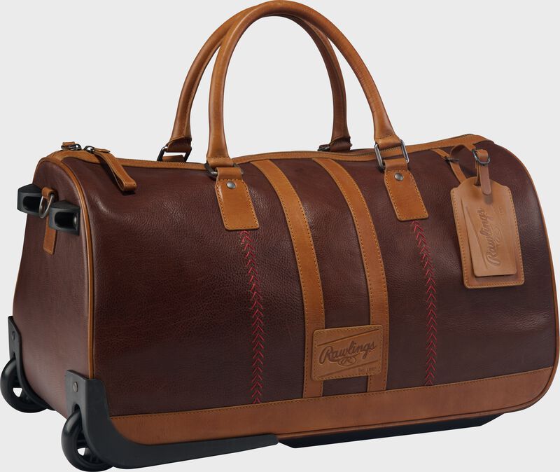Angle view of a brown Rawlings Heritage Wheeled Duffle Trolley Bag