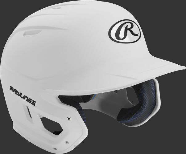 Right angle view of a matte MACH Senior batting helmet with a white shell