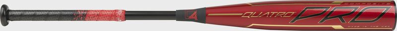 Barrel of a red BBZQ3 2020 Quatro Pro BBCOR bat with black and gold accents