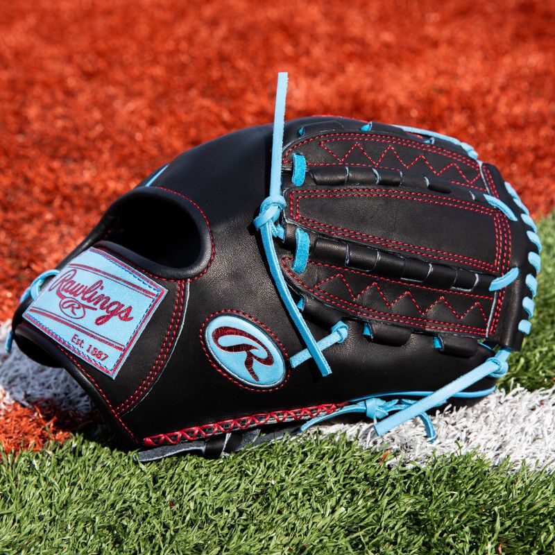 Thumb & web of a ColorSync 8.0 Heart of the Hide infield/pitcher's glove on a field