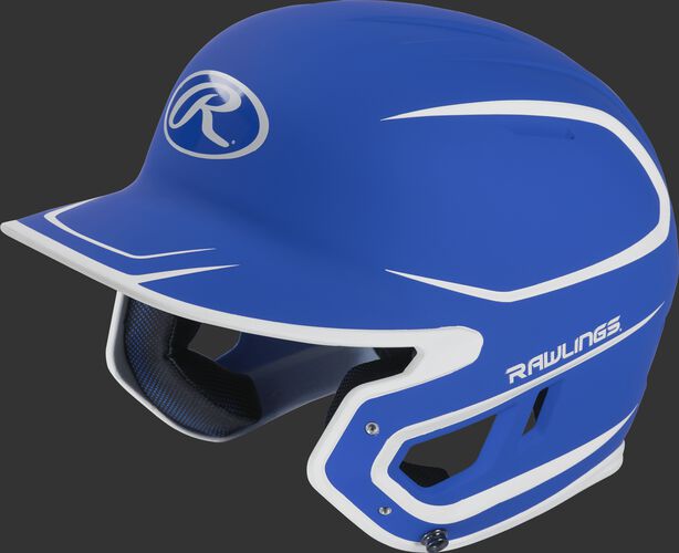 Left angle view of a Rawlings MACH Senior helmet with a two-tone matte royal/white shell