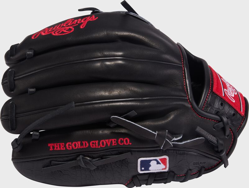 Back of a black Gameday 57 Series Max Fried Heart of the Hide Glove with the MLB logo on the pinky
