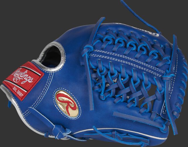 Thumb of a royal Gameday 57 Series Marcus Stroman Heart of the Hide glove with a gold Oval-R logo on the thumb - SKU: PRO205-MS0