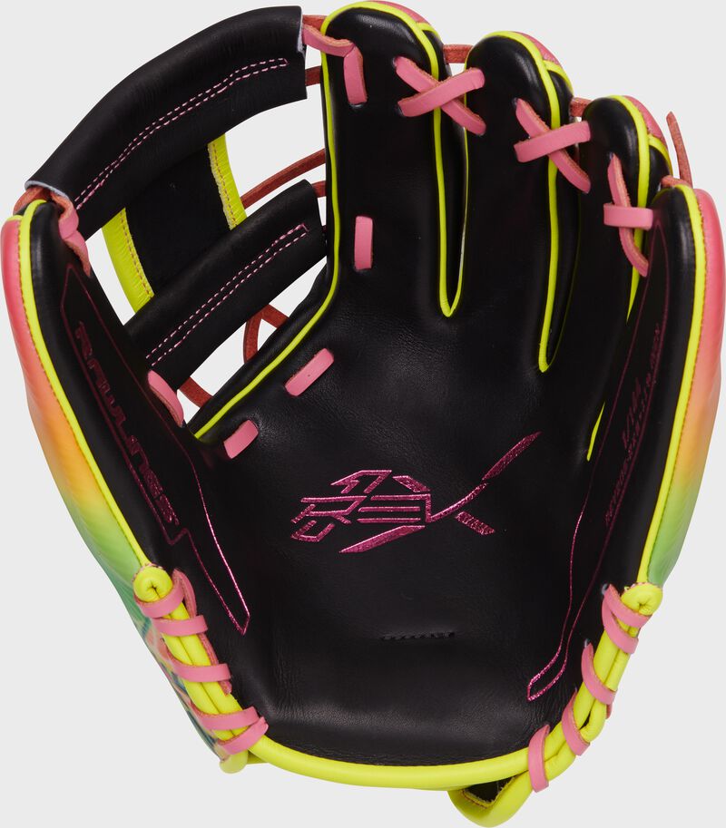 Black palm of a Rawlings exclusive REV1X infield glove with pink stamping and pink laces