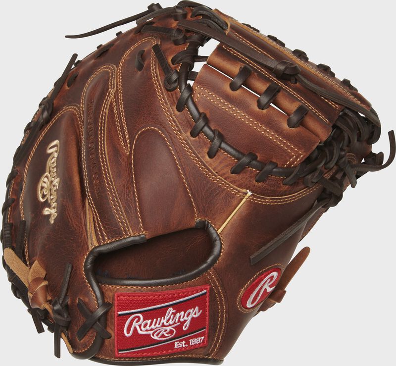 Chocolate back of a 33" Heritage Pro catcher's mitt with a red Rawlings patch - SKU: HPCM33CCH