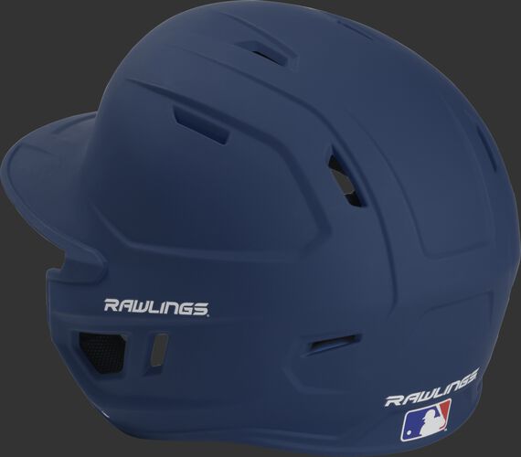 Back left view of a matte navy MACHEXTL MACH series batting helmet with air vents