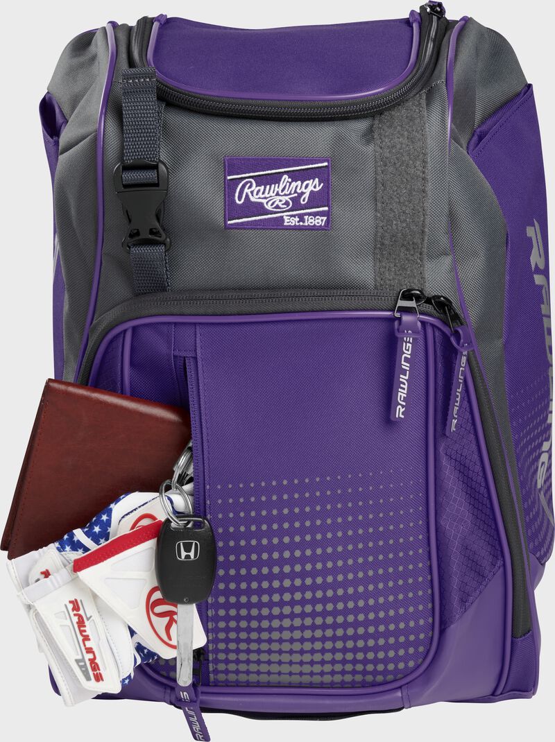 Wallet, keys, and batting gloves in the front valuables pocket of a purple Franchise baseball bag - SKU: FRANBP-PU