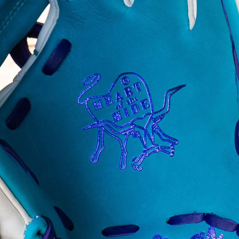 Picture of the Heart of the Hide logo on the teal palm of a Rawlings exclusive Heart of the Hide R2G Wing Tip 11.5" infield glove