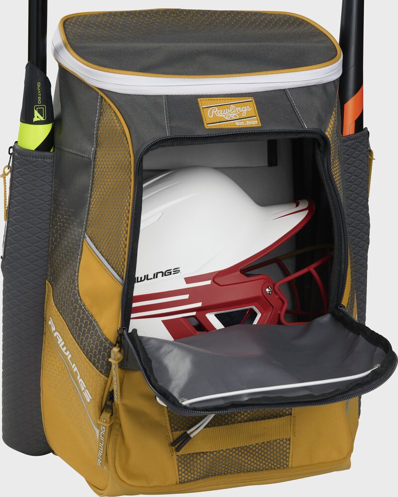 A light gold Impulse baseball backpack with a helmet in the main compartment - SKU: IMPLSE-LG