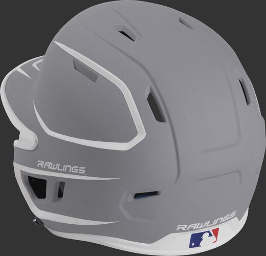 Back left view of a matte silver/white MACH series batting helmet with air vents