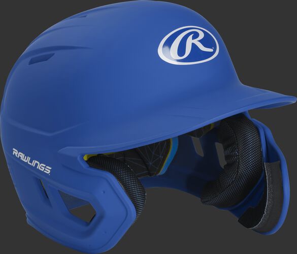 Right angle view of a MACHEXTR Rawlings Mach EXT junior helmet with a one-tone matte royal shell